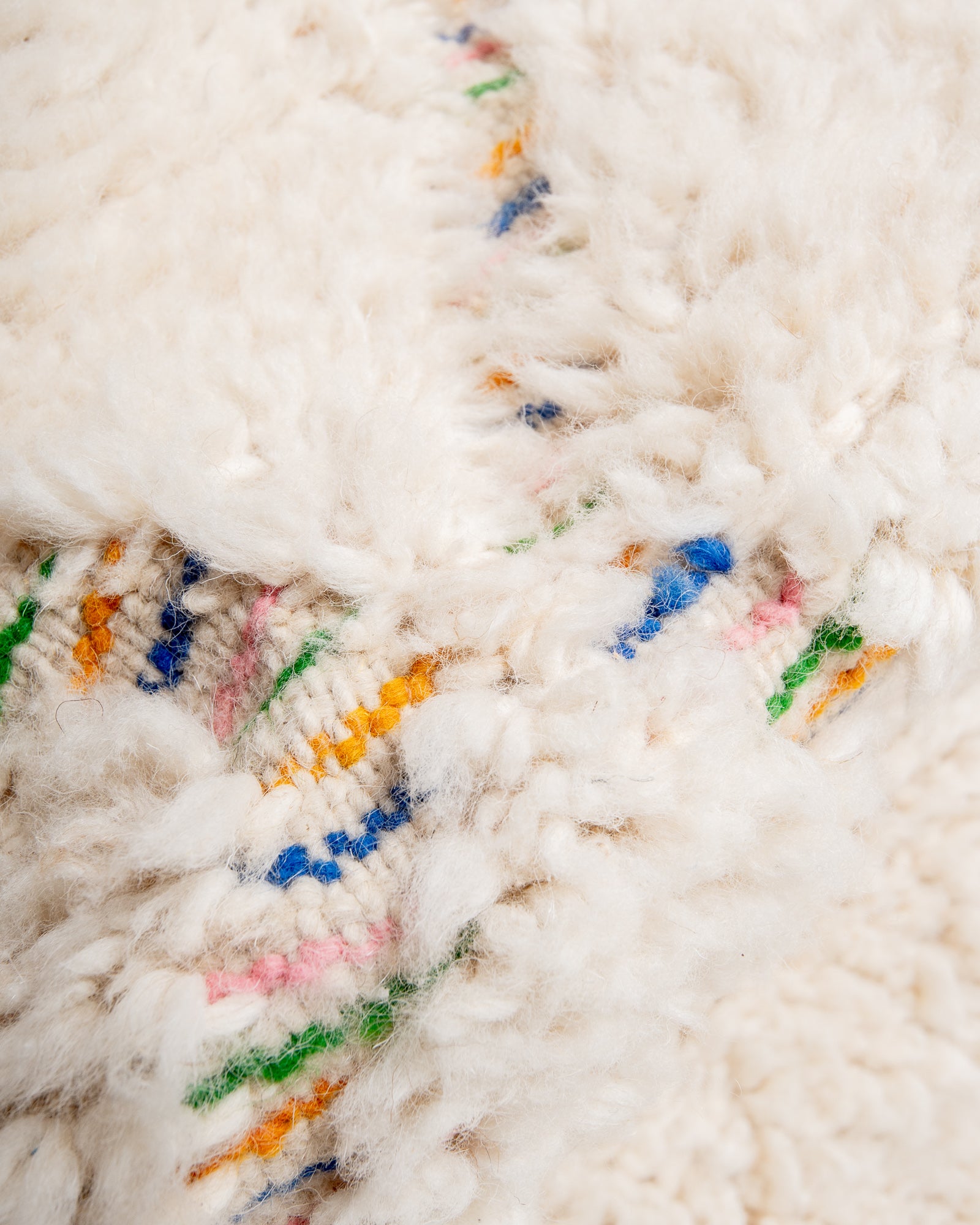 Modern, designer, handcrafted Berber rug from Morocco. Beniourain carpet with beautiful colours and patterns and fluffy wool texture.